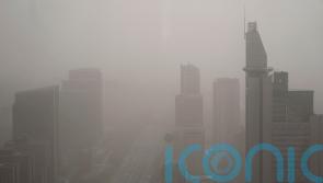 Northern China blanketed with floating sand and dust