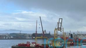 Cranes on site as investigations continue at dry dock where vessel toppled over
