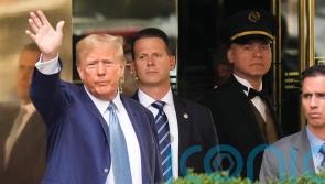 Donald Trump answering questions in fraud lawsuit, lawyer says