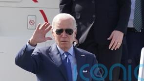 Biden looks at plaque in memory of late son and meets distant cousin at hospice