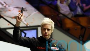 Neil Robertson storms into second round at Crucible after beating Wu Yize