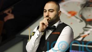 Hossein Vafaei storms past Ding Junhui to set up Ronnie O’Sullivan showdown