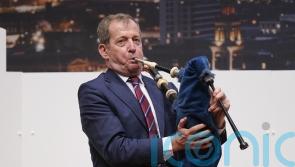 Alastair Campbell plays bagpipes lament for late Good Friday Agreement figures