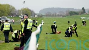 Number of arrests made after protesters try to stop Scottish Grand National