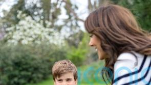 Prince Louis pictured being pushed in wheelbarrow by Kate before fifth birthday
