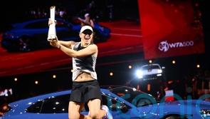Iga Swiatek lays down marker to win Porsche Grand Prix