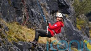William and Kate abseil together off cliff in Brecon Beacons