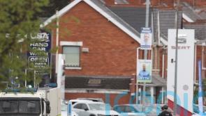 Man arrested after crash near Belfast police station