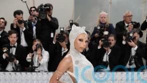 Doja Cat wears feline-inspired prosthetics to first ever Met Gala