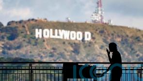 Late-night TV shows go dark as Hollywood writers begin strike