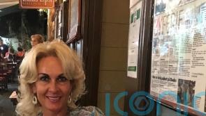 Man held on suspicion of murder after death of woman found with facial injuries