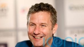 Adam Hills plans toilet breaks and limits drinking in preparation for coronation