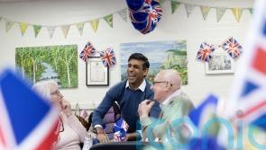 Rishi Sunak and Akshata Murty don aprons as surprise volunteers at lunch club
