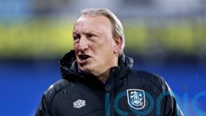 Neil Warnock signs off as Huddersfield boss with victory over relegated Reading