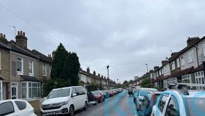 Man drove BMW into parked cars after being stabbed, neighbours say