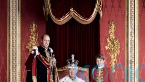 King marks coronation with photograph of himself with heirs