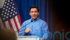Republican DeSantis vies with Trump to sway Iowa conservatives