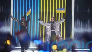 Tvorchi perform before sea of Ukrainian flags at Eurovision grand final