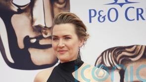 Kate Winslet leads trend for vampy black outfits at the Bafta TV awards