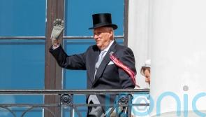 Norway’s ailing king celebrates Constitution Day as flag-waving children cheer