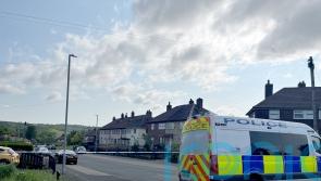 Man remanded on murder charges after pair found dead in Huddersfield