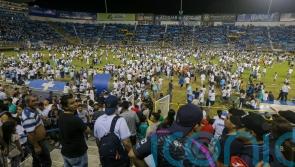 At least 12 dead in stampede at football stadium in El Salvador