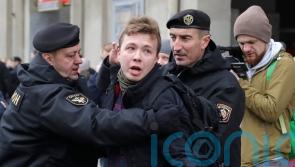 Belarusian journalist pulled off diverted flight ‘receives presidential pardon’