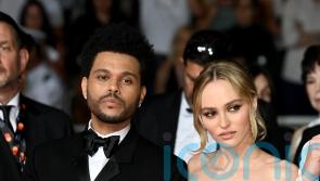 Lily-Rose Depp appears alongside The Weeknd at Cannes Film Festival