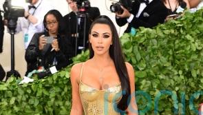 Kim Kardashian on parenting challenges: ‘There are nights I cry myself to sleep’