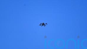 Man charged with flying drone above ground which saw football match halted