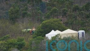 Police begin digging in woodland during Madeleine McCann searches
