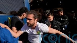Climate protesters face tear gas at TotalEnergies shareholder meeting in Paris