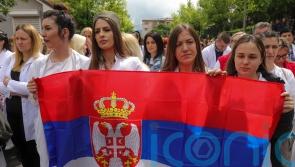 Ethnic Serbs gather in northern Kosovo town after clashes with Nato peacekeepers