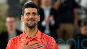 Novak Djokovic keeps focus on court to see off Marton Fucsovics at French Open
