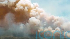 Wildfire in Canada contained while another burning out of control