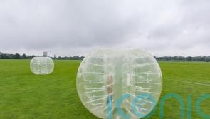 Nine-year-old boy seriously injured as inflatable zorb ball ‘blown off lake’