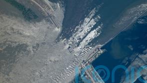 Waters continue to swell in southern Ukraine after dam breach