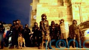 West Ham fans clash with riot police during European final celebrations