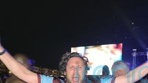 West Ham fan parties with players outside hotel to celebrate club’s victory