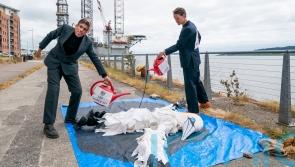 Climate campaigners cover ‘bird’ in fake oil in Rosebank protest