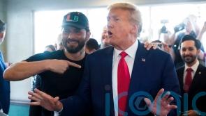 Donald Trump mixes roles as defendant and campaigner after historic charge
