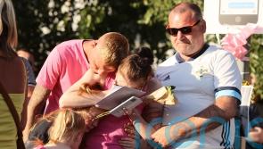 Brother of murdered 21-year-old woman thanks community as hundreds attend vigil