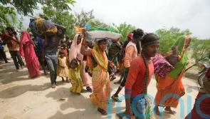India and Pakistan brace for fresh floods as cyclone makes landfall