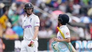England lose both openers between rain showers as Australia seize the initiative