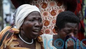 Ugandan border town prepares to bury victims of rebel massacre