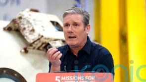 Any delay to green energy shift would be ‘historic mistake’, says Starmer