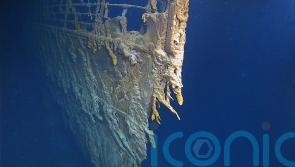Search continues for submersible with British billionaire among five onboard