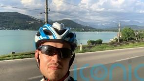 Man with muscle-wasting condition completes gruelling Ironman triathlon