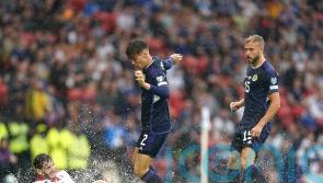 Managers decry weather stoppage as Scotland down Georgia at soaked Hampden Park