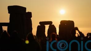 Revellers mark the Summer Solstice at Stonehenge and Avebury
